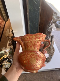 A Chinese ewer-shaped coral-red ground wall pocket vase with gilt lotus scrolls, Qianlong mark, 20th C.