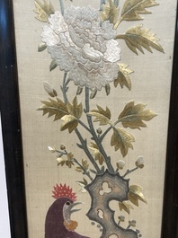 Four Chinese vertical silk embroideries with birds among blossoming branches, 20th C.