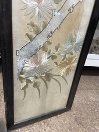 Four Chinese vertical silk embroideries with birds among blossoming branches, 20th C.