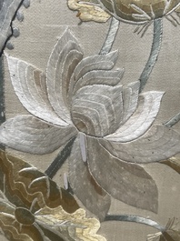 Four Chinese vertical silk embroideries with birds among blossoming branches, 20th C.