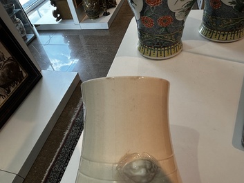A Chinese white glazed 'hu' vase, 19th C.
