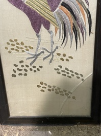 Four Chinese vertical silk embroideries with birds among blossoming branches, 20th C.
