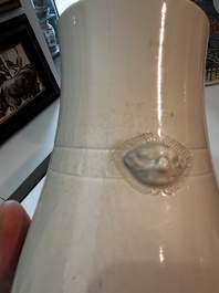 A Chinese white glazed 'hu' vase, 19th C.
