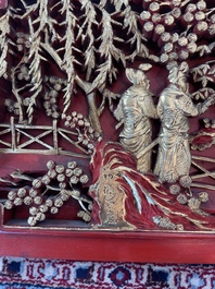 Deux panneaux en bois laqu&eacute; et dor&eacute; &agrave; d&eacute;cor figuratif, dont l'un est sign&eacute;, Chine, 19&egrave;me/20&egrave;me si&egrave;cle