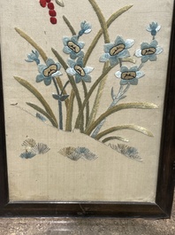 Four Chinese vertical silk embroideries with birds among blossoming branches, 20th C.
