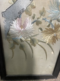 Four Chinese vertical silk embroideries with birds among blossoming branches, 20th C.