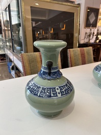 A pair of Chinese blue and white celadon 'kui dragons' vases, 19th/20th C.