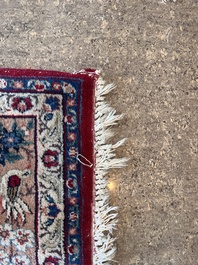 A Persian Tabriz 'tree of life' rug, wool on cotton, mid 20th C.