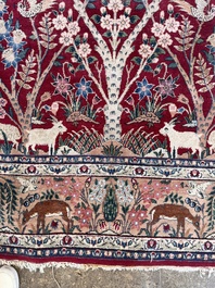A Persian Tabriz 'tree of life' rug, wool on cotton, mid 20th C.