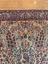 Een Perzisch Kerman (Kirman) tapijt met floraal decor, wol op katoen, eerste helft 20ste eeuw