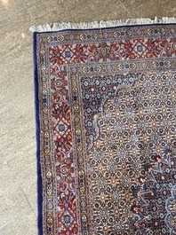 A Persian Moud rug with floral design, wool on cotton, 20th C.