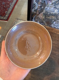 Five Chinese capucin brown ground cups and saucers with incised floral design, Qianlong