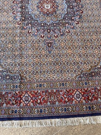 A Persian Moud rug with floral design, wool on cotton, 20th C.