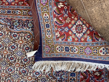 A Persian Moud rug with floral design, wool on cotton, 20th C.