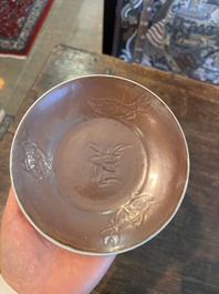 Five Chinese capucin brown ground cups and saucers with incised floral design, Qianlong