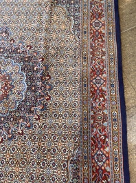 A Persian Moud rug with floral design, wool on cotton, 20th C.