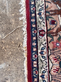 A Persian Tabriz 'tree of life' rug, wool on cotton, mid 20th C.
