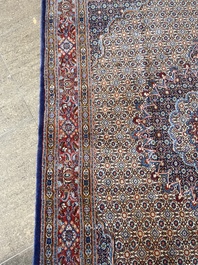 A Persian Moud rug with floral design, wool on cotton, 20th C.
