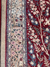 A Persian Tabriz 'tree of life' rug, wool on cotton, mid 20th C.