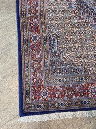 A Persian Moud rug with floral design, wool on cotton, 20th C.