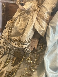 A Spanish polychrome decorated wax Madonna and Child adorned in brocade, 19th C.