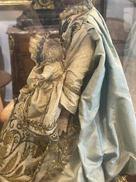 A Spanish polychrome decorated wax Madonna and Child adorned in brocade, 19th C.