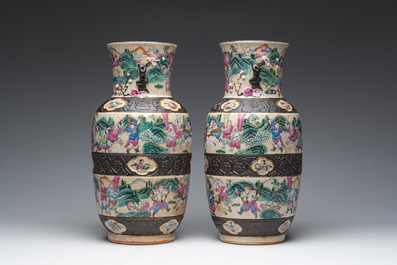 A pair of fine Chinese Nanking crackle glazed famille rose 'warrior' vases, 19th C.