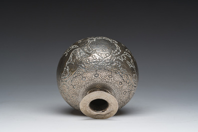 An Egyptian silver spherical vase with engraved design of figures in a landscape and flowers, 600/000, Cairo, dated 1936
