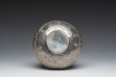 An Egyptian silver spherical vase with engraved design of figures in a landscape and flowers, 600/000, Cairo, dated 1936