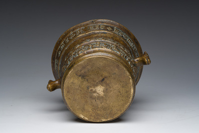 A Flemish bronze mortar with relief design and animal head-shaped handles with pestle, Petrus Van den Ghein, dated 1584, 19th C.