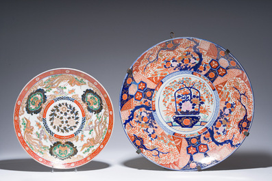 Two Japanese Imari 'fauna and flora' dishes and a ko-Kutani style 'one hundred faces' jardini&egrave;re, marked Kutani Akiyama, Meiji, 19th/20th C.