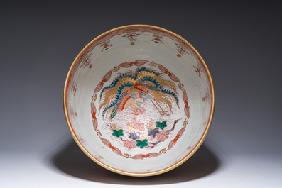 Two Japanese Imari 'fauna and flora' dishes and a ko-Kutani style 'one hundred faces' jardini&egrave;re, marked Kutani Akiyama, Meiji, 19th/20th C.