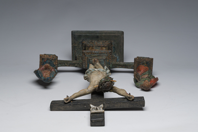 A Spanish polychrome decorated wooden crucifixion group with Jesus on the cross flanked by Mary and John the Evangelist, 18th C.
