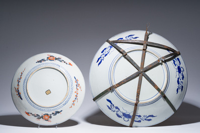 Two Japanese Imari 'fauna and flora' dishes and a ko-Kutani style 'one hundred faces' jardini&egrave;re, marked Kutani Akiyama, Meiji, 19th/20th C.