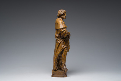 A French carved limewooden 'Saint Roch and his dog' group, 18th C.