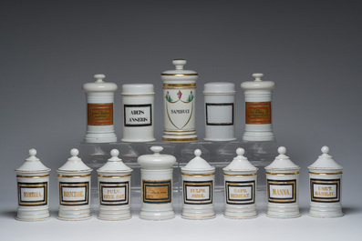 Thirteen Belgian and French gilt and polychrome decorated porcelain pharmacy jars and two bourdalous, 19th C.