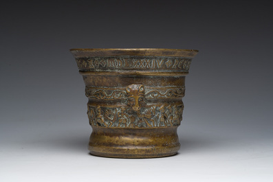 A Flemish bronze mortar with relief design and animal head-shaped handles with pestle, Petrus Van den Ghein, dated 1584, 19th C.