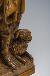 A French carved limewooden 'Saint Roch and his dog' group, 18th C.