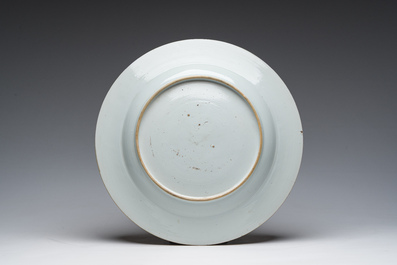A Chinese blue and white dish with an animated river landscape, Qianlong