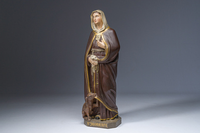 A polychrome decorated plaster figure of Saint Margaret with her dog, 19th/20th C.