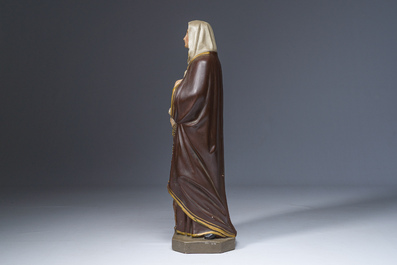 A polychrome decorated plaster figure of Saint Margaret with her dog, 19th/20th C.