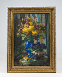 Frans Mortelmans (1865&ndash;1936): 'Yellow roses in blue vase, blue violets in low vase on table', oil on canvas