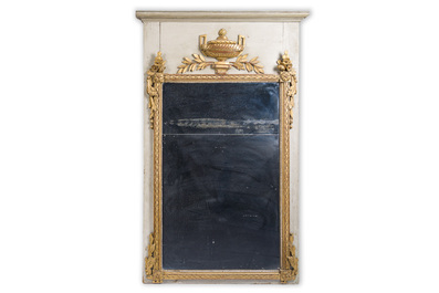 A French Louis XVI patinated and gilt wooden trumeau mirror, second half 18th C.