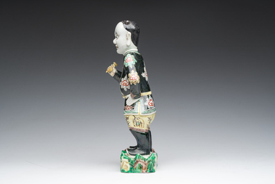 A Chinese famille noire 'soldier' figure, Kangxi
