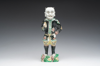 A Chinese famille noire 'soldier' figure, Kangxi