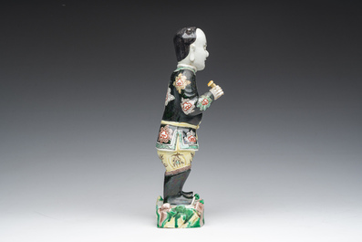 A Chinese famille noire 'soldier' figure, Kangxi