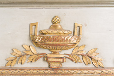 A French Louis XVI patinated and gilt wooden trumeau mirror, second half 18th C.