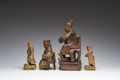 Four Chinese partially gilt and lacquered wooden 'Immortals' figures, a.o. Guandi, Qing