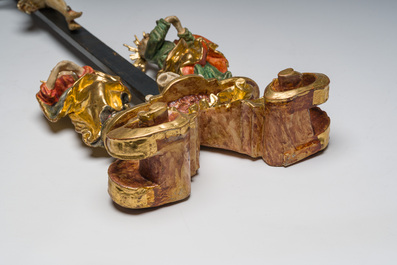 An Italian gilt and polychrome decorated wooden crucifixion group with Jesus on the cross flanked by Mary and John the Evangelist, 18th C.