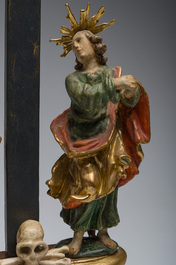 An Italian gilt and polychrome decorated wooden crucifixion group with Jesus on the cross flanked by Mary and John the Evangelist, 18th C.